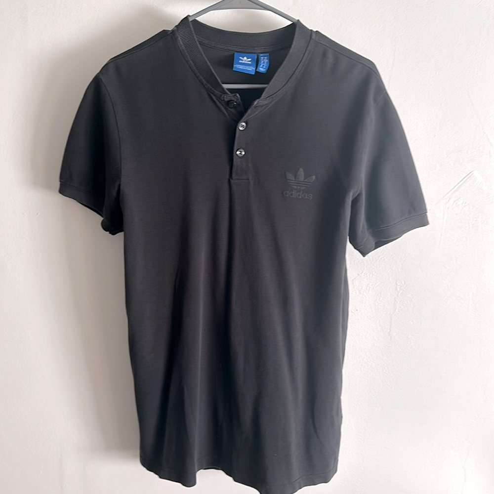 Adidas henley men’s short sleeve shirt. Great fit, really shows off the biceps.